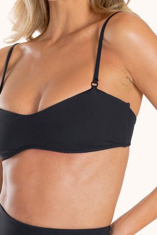 Detail view - Joyce Bandeau Bikini Top in Brave Black, structured bandeau construction