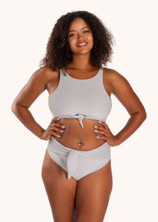 Front view - Lily Bikini Bottom in City Girl Stripe from POST SWIM in collaboration with The Chemo Club, high-rise adjustable tie front
