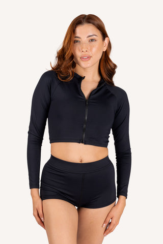 Front view - flat-closure mastectomy Melanie zip-front rash guard, black | POST SWIM
