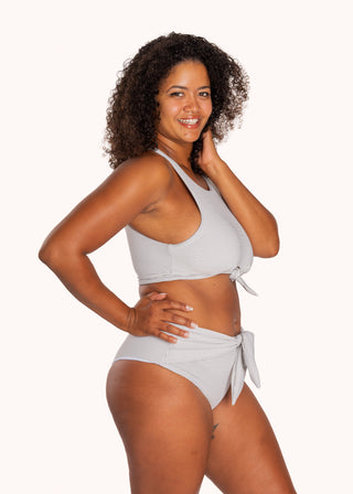 Side view of the Zoey Bikini Top in City Girl Stripe, showing the fit through the torso and side coverage.