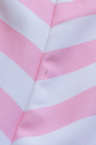 Close-up of Pink & White Striped Boy Short fabric showing a small factory imperfection along the seam | POST SWIM