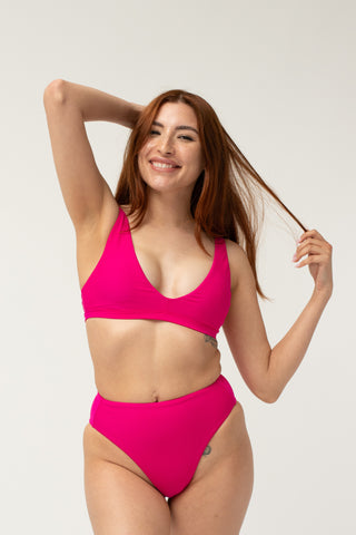 post swim, strength collection, jen powerful pink, jen pink, jen triangle bikini top, triangle bikini top, bikini top with pockets, bikini top with removable cups, scar covering bikini top, breast cancer survivor, cancer survivor, post-surgery swim, post-surgery swimsuit, scar coverage bikini top, mastectomy bikini top, lumpectomy bikini top, flat closure bikini top, pocketed bikini top, waterproof molded cup bikini top, adjustable bikini top, breast prosthesis bikini top