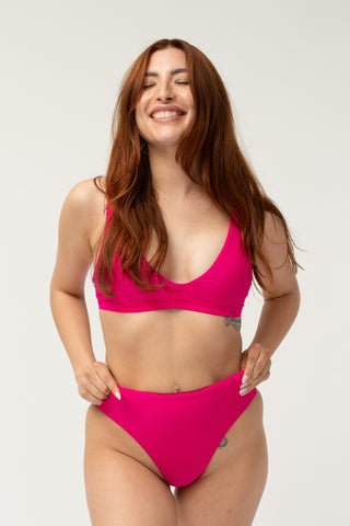 post swim, strength collection, jen powerful pink, jen pink, jen triangle bikini top, triangle bikini top, bikini top with pockets, bikini top with removable cups, scar covering bikini top, breast cancer survivor, cancer survivor, post-surgery swim, post-surgery swimsuit, scar coverage bikini top, mastectomy bikini top, lumpectomy bikini top, flat closure bikini top, pocketed bikini top, waterproof molded cup bikini top, adjustable bikini top, breast prosthesis bikini top